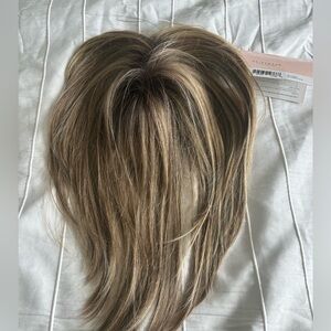 New topper by Raquel Welch